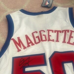 A signed clipper jersey with tags